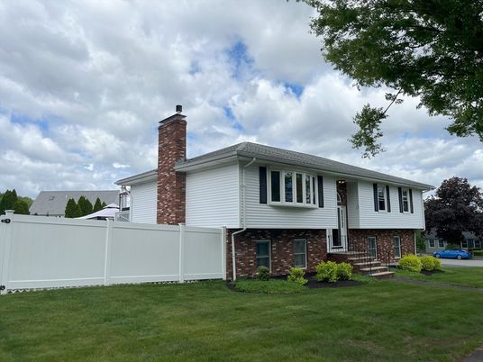 Backyard, Exterior, Facade, Brick Facade, Raised Ranch