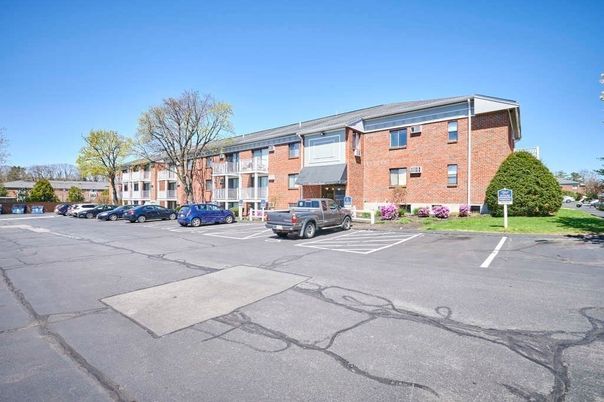 Exterior, Facade, Brick Facade, Condo Building