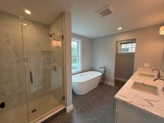 Bathroom, Dual Sink Vanities, Free Standing Baths, Glass Shower, Interior, Marble Walls, Recessed Lighting