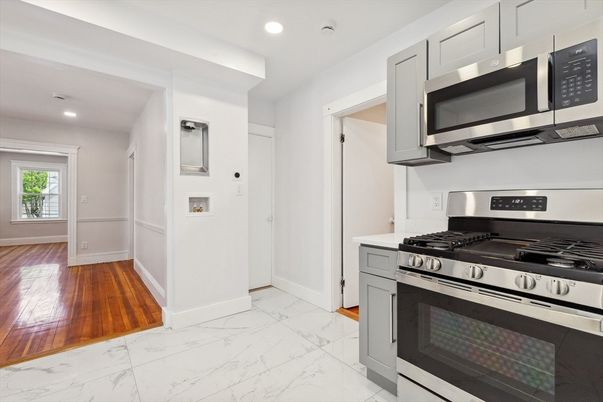 Interior, Kitchen, Marble, Recessed Lighting, Stainless Steel Appliances, Wood Texture Flooring