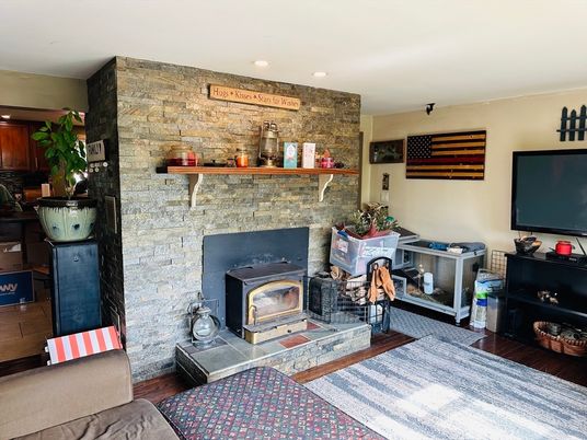 Fireplace, Interior, Recessed Lighting, Stone Walls, Wood Texture Flooring