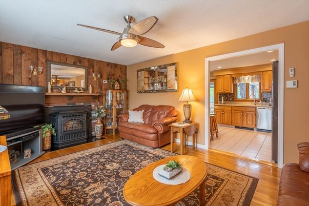 Fireplace, Interior, Kitchen, Recessed Lighting, Wood Texture Flooring, Wooden Walls