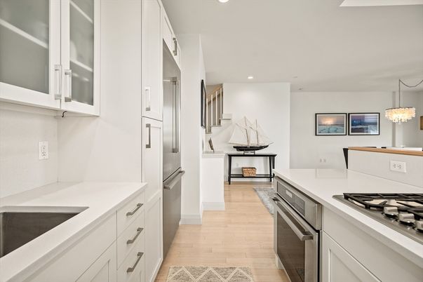 Chandelier, Interior, Kitchen, Recessed Lighting, Stainless Steel Appliances, Wood Texture Flooring