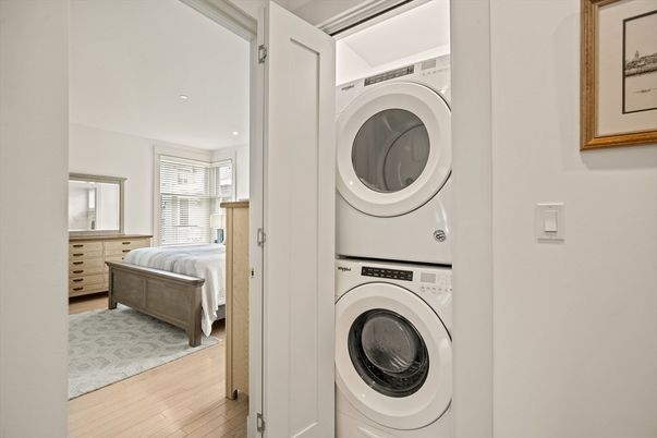 Bedroom, Interior, Recessed Lighting, Utility Closets, Washer, Wood Texture Flooring