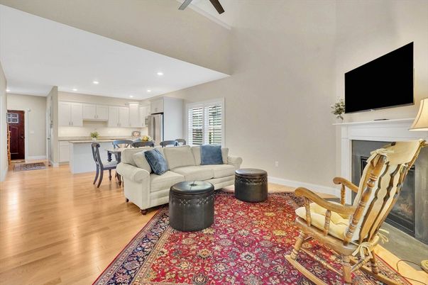 Dining room, Fireplace, Interior, Kitchen, Living room, Recessed Lighting, Stainless Steel Appliances, Wood Texture Flooring