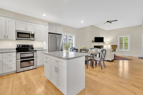 Dining room, Interior, Kitchen, Living room, Recessed Lighting, Stainless Steel Appliances, Wood Texture Flooring