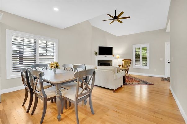 Dining room, Fireplace, Interior, Living room, Recessed Lighting, Wood Texture Flooring