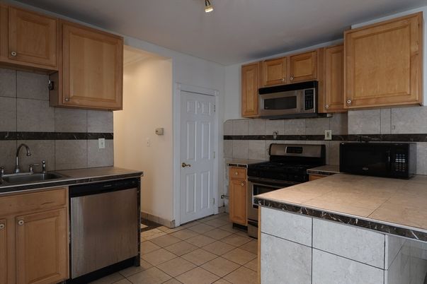 Interior, Kitchen, Stainless Steel Appliances, Tile Countertops