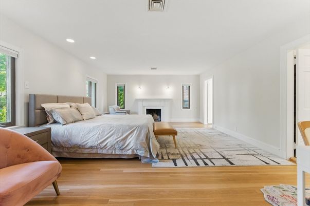 Bedroom, Fireplace, Interior, Recessed Lighting, Wood Texture Flooring