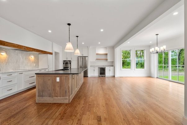 Chandelier, Interior, Kitchen, Pendant Lights, Recessed Lighting, Stainless Steel Appliances, Wood Texture Flooring