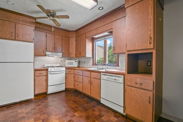 Interior, Kitchen, Recessed Lighting, Washer, Wood Texture Flooring