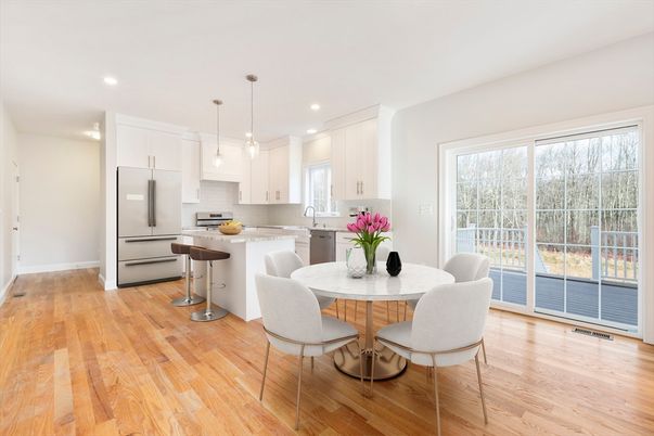 Dining room, Interior, Kitchen, Pendant Lights, Recessed Lighting, Stainless Steel Appliances, Wood Texture Flooring