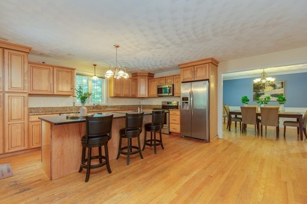 Chandelier, Dining room, Interior, Kitchen, Pendant Lights, Stainless Steel Appliances, Wood Texture Flooring