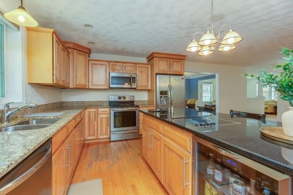 Chandelier, Interior, Kitchen, Recessed Lighting, Stainless Steel Appliances, Wood Texture Flooring
