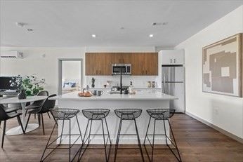 Dining room, Interior, Kitchen, Recessed Lighting, Stainless Steel Appliances, Wood Texture Flooring