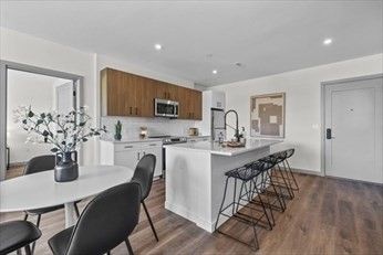 Dining room, Interior, Kitchen, Recessed Lighting, Stainless Steel Appliances, Wood Texture Flooring