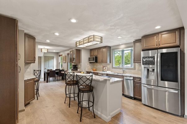 Dining room, Interior, Kitchen, Recessed Lighting, Stainless Steel Appliances, Wood Texture Flooring