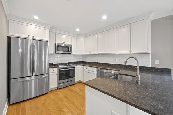 Interior, Kitchen, Recessed Lighting, Stainless Steel Appliances, Wood Texture Flooring