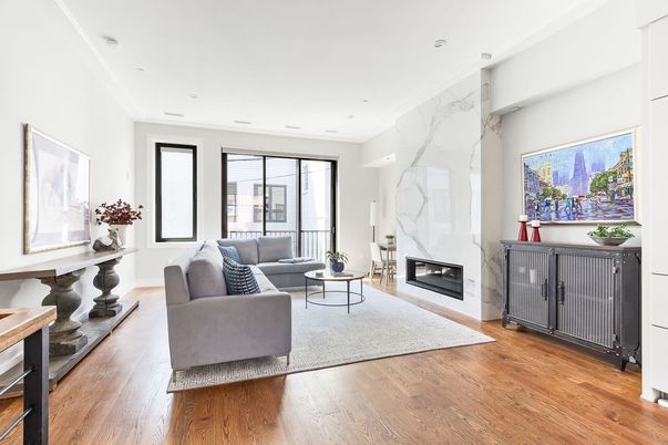 Fireplace, Interior, Living room, Marble Walls, Recessed Lighting, Wood Texture Flooring