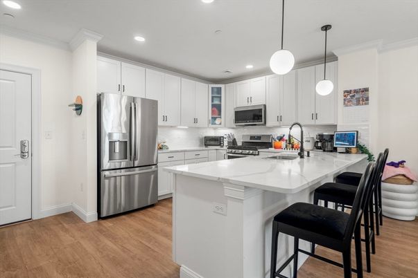 Interior, Kitchen, Pendant Lights, Recessed Lighting, Stainless Steel Appliances, Wood Texture Flooring