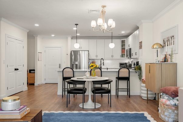 Chandelier, Dining room, Interior, Kitchen, Pendant Lights, Recessed Lighting, Stainless Steel Appliances, Wood Texture Flooring