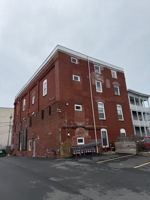 Exterior, Facade, Brick Facade, Condo Building