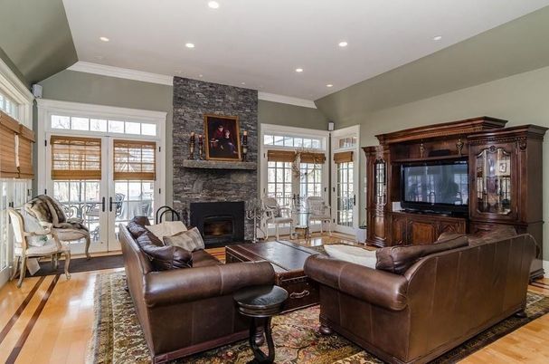 Fireplace, Interior, Living room, Recessed Lighting, Stone Walls, Wood Texture Flooring