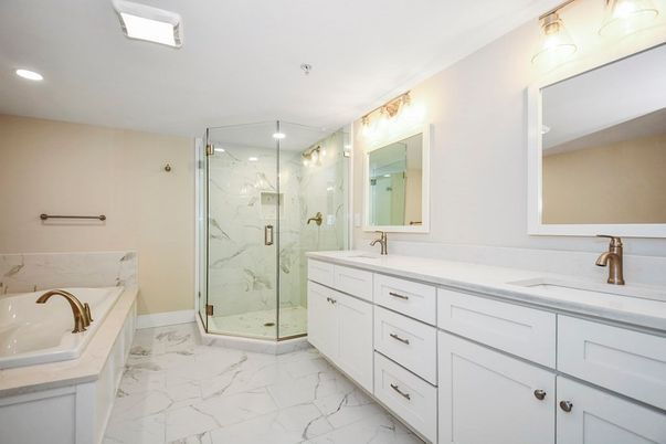 Bathroom, Dual Sink Vanities, Glass Shower, Interior, Marble, Marble Walls, Recessed Lighting