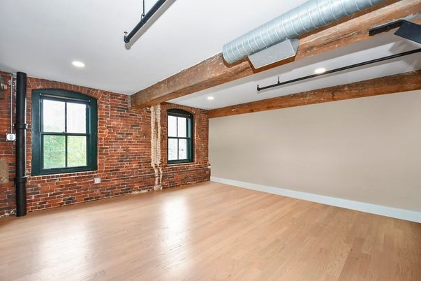 Empty room, Interior, Recessed Lighting, Stone Walls, Wood Texture Flooring