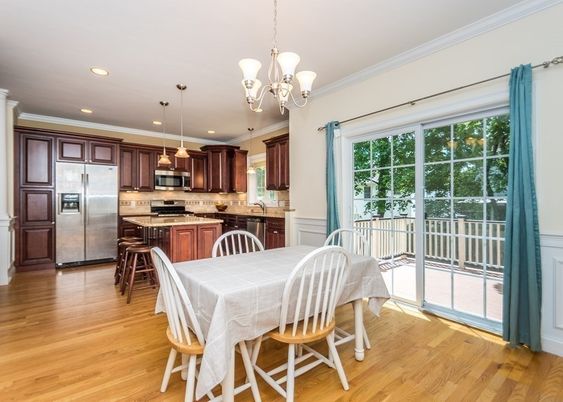 Chandelier, Dining room, Interior, Kitchen, Pendant Lights, Recessed Lighting, Stainless Steel Appliances, Wood Texture Flooring