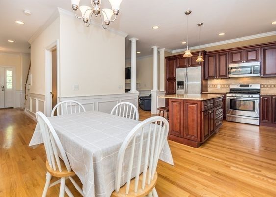 Chandelier, Dining room, Interior, Kitchen, Pendant Lights, Recessed Lighting, Stainless Steel Appliances, Wood Texture Flooring