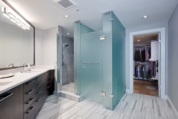 Bathroom, Dual Sink Vanities, Glass Shower, Interior, Recessed Lighting, Walk-in Closets, Wood Texture Flooring