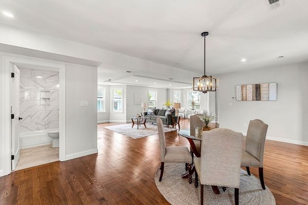 Bathroom, Dining room, Interior, Living room, Marble Walls, Pendant Lights, Recessed Lighting, Wood Texture Flooring