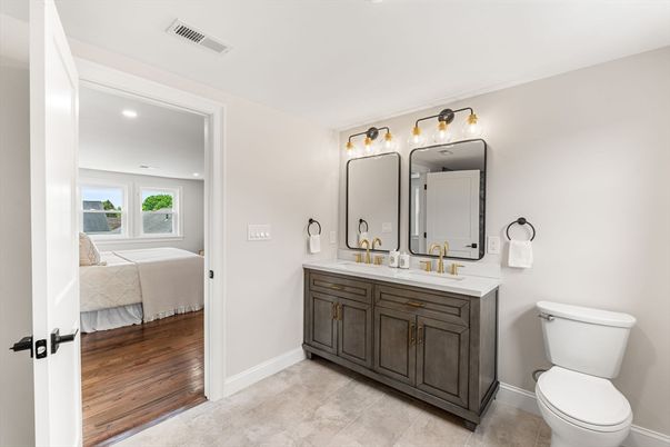 Bathroom, Bedroom, Dual Sink Vanities, Interior, Recessed Lighting, Wood Texture Flooring