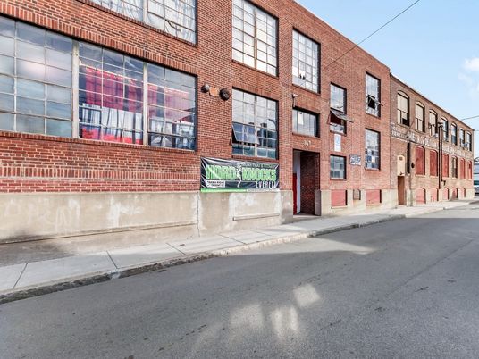 Exterior, Facade, Brick Facade, Condo Building