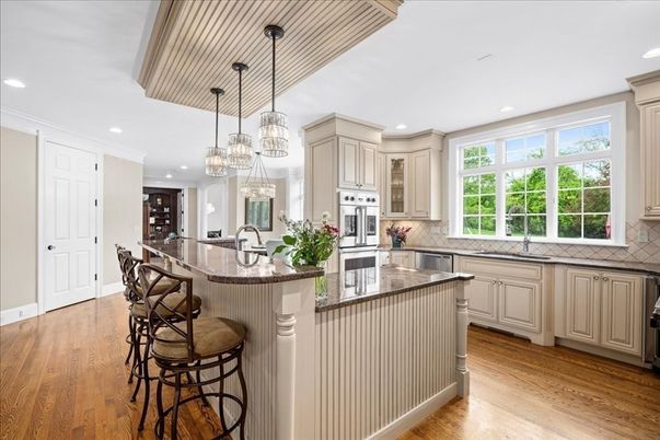 Chandelier, Interior, Kitchen, Pendant Lights, Recessed Lighting, Stainless Steel Appliances, Wood Texture Flooring
