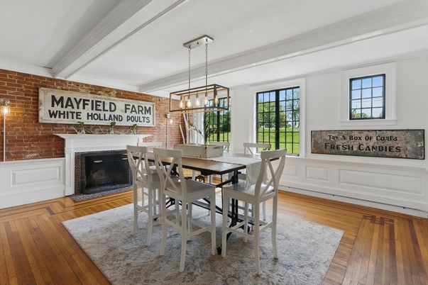 Dining room, Fireplace, Interior, Pendant Lights, Stone Walls, Wood Texture Flooring