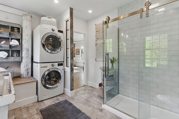 Bathroom, Glass Shower, Interior, Recessed Lighting, Utility Closets, Washer, Wood Texture Flooring