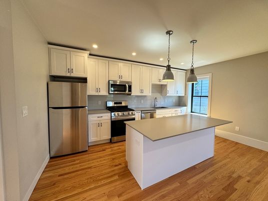 Interior, Kitchen, Pendant Lights, Recessed Lighting, Stainless Steel Appliances, Wood Texture Flooring