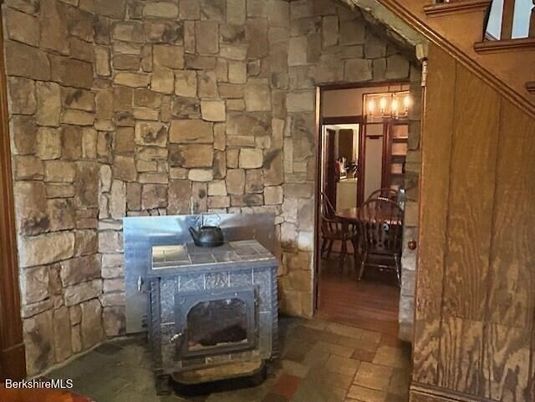 Chandelier, Dining room, Fireplace, Interior, Stone Walls
