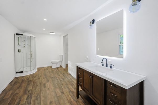 Bathroom, Glass Shower, Interior, Recessed Lighting, Wood Texture Flooring