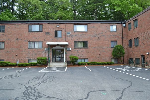 Exterior, Facade, Brick Facade, Condo Building
