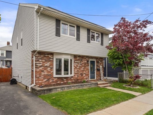 Exterior, Facade, Brick Facade, Raised Ranch