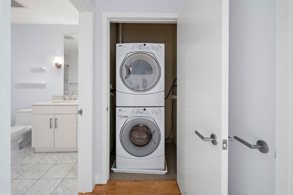 Empty room, Interior, Kitchen, Pendant Lights, Recessed Lighting, Stainless Steel Appliances, Wood Texture Flooring
