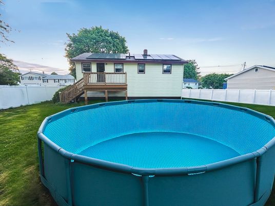 Exterior, Pool, Solar Panels