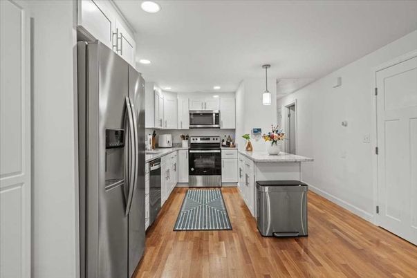 Interior, Kitchen, Pendant Lights, Recessed Lighting, Stainless Steel Appliances, Wood Texture Flooring