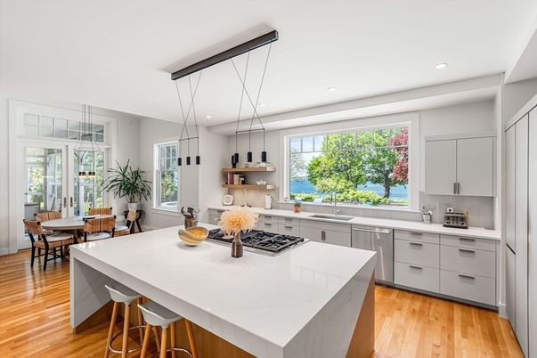 Dining room, Interior, Kitchen, Pendant Lights, Recessed Lighting, Stainless Steel Appliances, Wood Texture Flooring