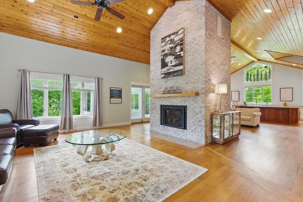 Fireplace, Interior, Living room, Recessed Lighting, Stone Walls, Wooden Ceilings, Wood Texture Flooring