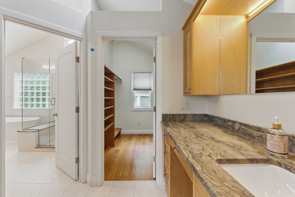 Bathroom, Dual Sink Vanities, Glass Shower, Interior, Wood Texture Flooring