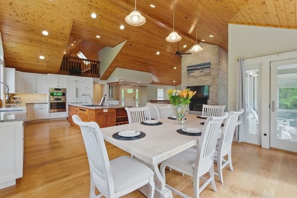 Dining room, Fireplace, Interior, Kitchen, Pendant Lights, Recessed Lighting, Stainless Steel Appliances, Stone Walls, Wooden Beams, Wooden Ceilings, Wood Texture Flooring